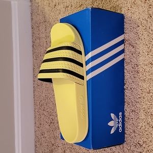 Adidas Adilette in light/bright yellow with black stripes size 10